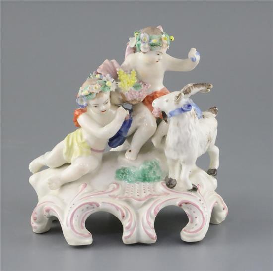 A Vauxhall porcelain group of two Bacchanalian cherubs and a goat, c.1760-5, H. 14.5cm